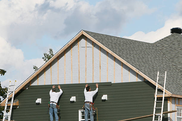 Professional Siding technician working in Leicester, NC